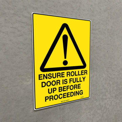 Warning Ensure Roller Door Is Fully Up Before Proceeding Sign - Image 2